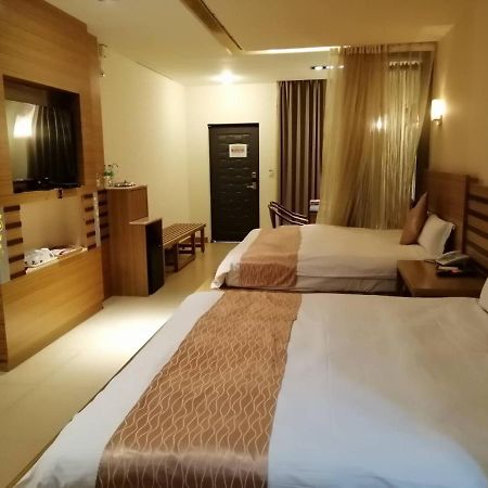 Nikaido Business Hotel Minxiong Exterior foto